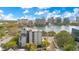 Spectacular aerial view highlighting the building's location with a lake view with the city skyline as its backdrop at 401 E Robinson St # 202, Orlando, FL 32801