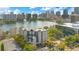 Stunning aerial view of the building and its downtown Orlando lakefront setting at 401 E Robinson St # 202, Orlando, FL 32801