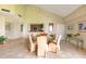 Dining area with seating for six near the kitchen and living area at 401 E Robinson St # 202, Orlando, FL 32801