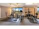 Spacious gym featuring a variety of exercise equipment and ample natural light from large windows with scenic outside views at 401 E Robinson St # 202, Orlando, FL 32801