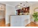 Modern kitchen with stainless steel appliances and an open view to the dining area at 401 E Robinson St # 202, Orlando, FL 32801