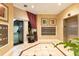 Welcoming lobby with tile flooring, elevator, and mailboxes for residents at 401 E Robinson St # 202, Orlando, FL 32801