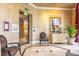 Inviting lobby area with neutral colors, tiled floor, furniture, and front door access at 401 E Robinson St # 202, Orlando, FL 32801