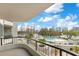 Balcony view of the pool area with palm trees and a beautiful city skyline at 401 E Robinson St # 202, Orlando, FL 32801
