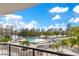 Balcony view of the pool area with palm trees and a beautiful city skyline at 401 E Robinson St # 202, Orlando, FL 32801