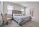 Comfortable bedroom featuring a neutral color scheme, plush carpeting, and en suite bathroom at 4353 Lana Ave, Davenport, FL 33897