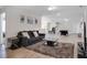 Open living room with pool table, comfortable seating, and neutral decor at 4353 Lana Ave, Davenport, FL 33897