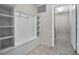 Mud room with built in storage and access to the laundry room at 4353 Lana Ave, Davenport, FL 33897