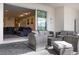 Covered patio featuring patio furniture and a view into the living area at 4353 Lana Ave, Davenport, FL 33897