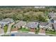 Aerial shot showcasing the neighborhood's layout, houses, landscaping, and community amenities at 4419 Liberty Bell Cv, Orlando, FL 32817