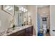 Well-appointed bathroom with granite countertop vanity and a shower-tub combo for convenience at 4419 Liberty Bell Cv, Orlando, FL 32817