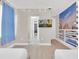 Themed bedroom featuring two beds, Frozen wall mural, TV, and sliding door offers a playful and magical space at 480 Burma St, Kissimmee, FL 34747