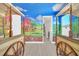 Themed room offering custom wagon-style beds, muraled walls, and a painted sky ceiling at 480 Burma St, Kissimmee, FL 34747
