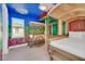 Themed room offering custom wagon-style beds, muraled walls, and a painted sky ceiling at 480 Burma St, Kissimmee, FL 34747