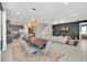 Open living space with kitchen, dining, and living areas for modern living at 480 Burma St, Kissimmee, FL 34747