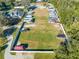 Aerial view of expansive parking lot for RVs, campers, and boats, perfect for storage at 4933 Raylene Way, St Cloud, FL 34771