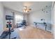 Bedroom with home gym, a ceiling fan, and neutral carpet at 4933 Raylene Way, St Cloud, FL 34771