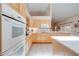 Bright kitchen featuring modern appliances and ample cabinet space at 4933 Raylene Way, St Cloud, FL 34771