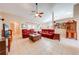Comfortable living room with neutral tile floors and cozy seating at 4933 Raylene Way, St Cloud, FL 34771