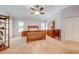 Spacious main bedroom with carpet, ceiling fan, and an ensuite bath at 4933 Raylene Way, St Cloud, FL 34771