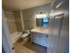 Bathroom featuring a white vanity with undermount sink, framed mirror, and tub with shower at 5959 Westgate Dr # 1526, Orlando, FL 32835