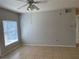A living room featuring a ceiling fan and tile floor at 5959 Westgate Dr # 1526, Orlando, FL 32835