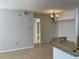 The open living area offers tile floors, access to the kitchen, and plenty of space at 5959 Westgate Dr # 1526, Orlando, FL 32835