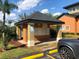 Exterior view of mail kiosk with convenient parking, mature landscaping, and community mailboxes at 5959 Westgate Dr # 1526, Orlando, FL 32835