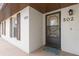 Inviting front entrance with stylish door, clear numbering, and clean exterior at 600 Northern Way # 502, Winter Springs, FL 32708