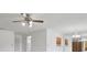 Ceiling fan with light fixture in a room featuring doorways to other rooms at 600 Northern Way # 502, Winter Springs, FL 32708