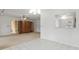 Bright living area showcasing tile floors, built-in shelving, and open layout at 600 Northern Way # 502, Winter Springs, FL 32708