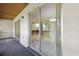 Enclosed patio with sliding glass doors leading into the home's living space, with tiled flooring at 600 Northern Way # 502, Winter Springs, FL 32708