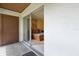The bedroom is easily viewed through the sliding glass door of the screened porch at 600 Northern Way # 502, Winter Springs, FL 32708