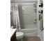 Bathroom showcasing the bathtub with white shell and seahorse themed shower curtain at 6832 Sw 93Rd Ave, Ocala, FL 34481