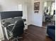 Home office setup with multiple monitors, desk, and comfortable chair at 6832 Sw 93Rd Ave, Ocala, FL 34481