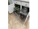 Kitchen cabinets feature convenient pull-out shelves to maximize storage and organization of cookware at 6832 Sw 93Rd Ave, Ocala, FL 34481