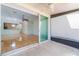 Private screened patio area with sliding glass doors that offer a seamless transition from the indoor living space at 6936 Hochad Dr, Orlando, FL 32819