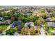 Aerial view of home and property, with lush surroundings at 701 Palenci Ct, Winter Springs, FL 32708