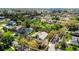 Aerial view of property with mature trees and meticulous landscaping, surrounded by other residences at 701 Palenci Ct, Winter Springs, FL 32708