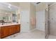 Well-appointed bathroom with vanity, shower, and neutral tones, providing a clean and relaxing space at 701 Palenci Ct, Winter Springs, FL 32708