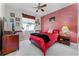 Charming bedroom featuring a decorative, textured wall and a large window at 701 Palenci Ct, Winter Springs, FL 32708