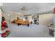 Spacious bonus room with a neutral color palette, a ceiling fan, and a playful decor at 701 Palenci Ct, Winter Springs, FL 32708