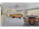 Open game room featuring a pool table, barrel table, and easy access to upstairs at 701 Palenci Ct, Winter Springs, FL 32708