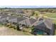 Aerial view of the homes backyards, one with a pool and a covered lanai at 7977 Hanson Bay Pl, Kissimmee, FL 34747