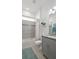 Bright bathroom with a shower-tub, granite counter, and modern fixtures at 7977 Hanson Bay Pl, Kissimmee, FL 34747