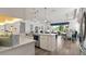Spacious kitchen with large island overlooking living and dining areas, perfect for entertaining at 7977 Hanson Bay Pl, Kissimmee, FL 34747
