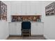 Home office features bright cabinets and a corkboard to keep your life organized at 7977 Hanson Bay Pl, Kissimmee, FL 34747