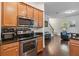 Kitchen view showcasing stainless steel appliances and open floor plan to the living area at 8255 Bryce Canyon Ave, Windermere, FL 34786