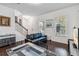 Bright living room featuring hardwood floors, neutral walls, and lots of natural light at 8255 Bryce Canyon Ave, Windermere, FL 34786