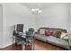 Cozy home office area with comfortable seating and natural light at 8255 Bryce Canyon Ave, Windermere, FL 34786